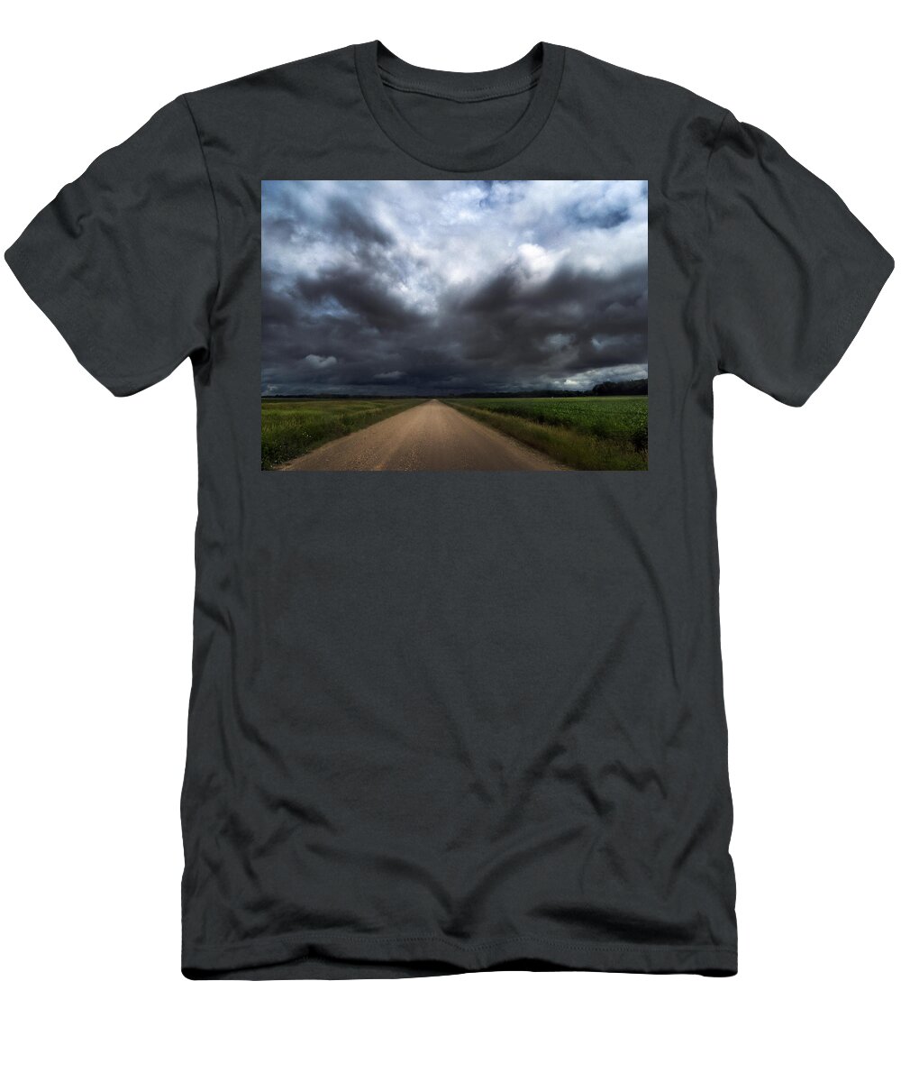 Kansas T-Shirt featuring the photograph Riding into Dark Clouds by Eric Benjamin