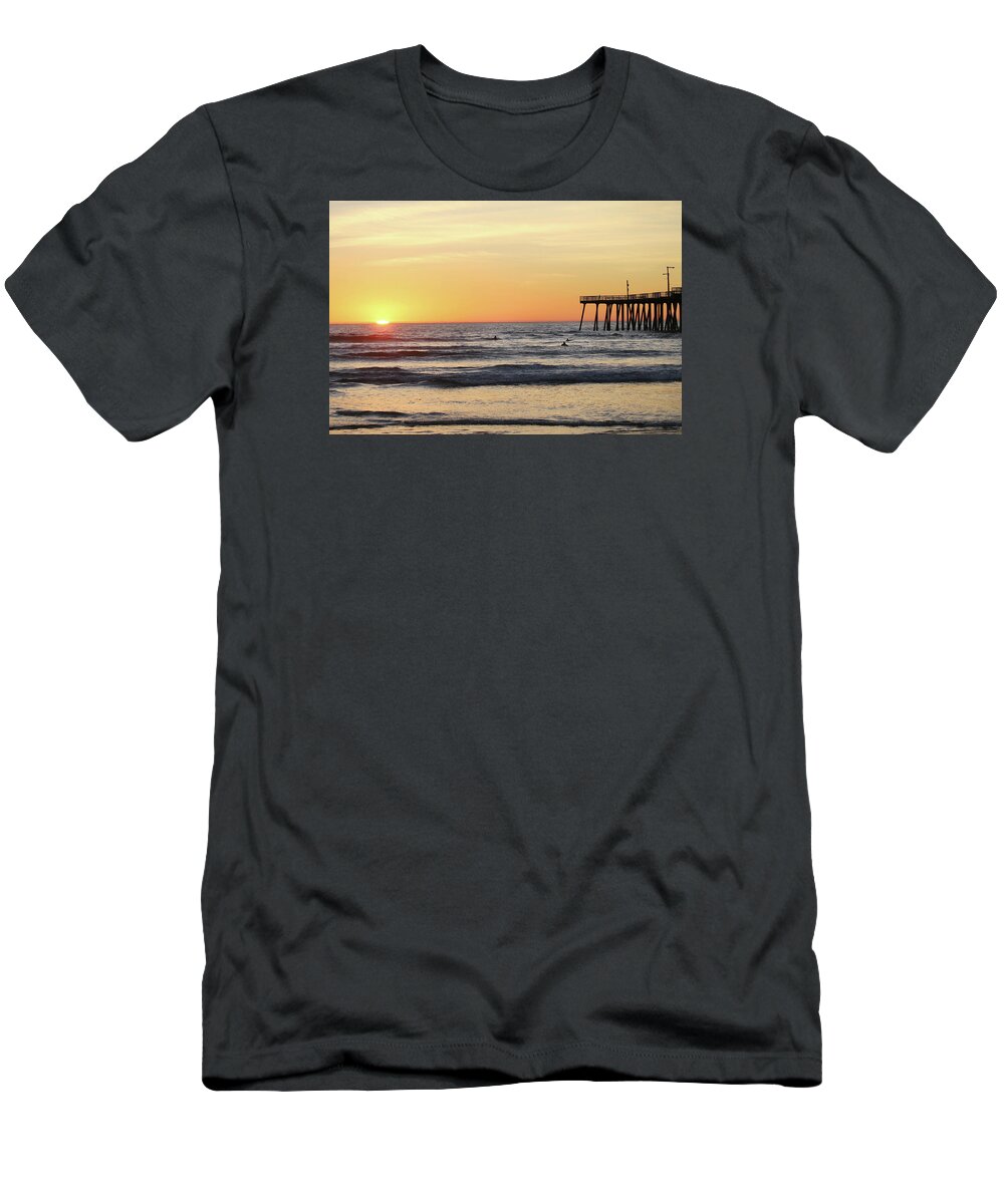 Pismo Beach Pier T-Shirt featuring the photograph Surfing in the Setting Sun by Art Block Collections