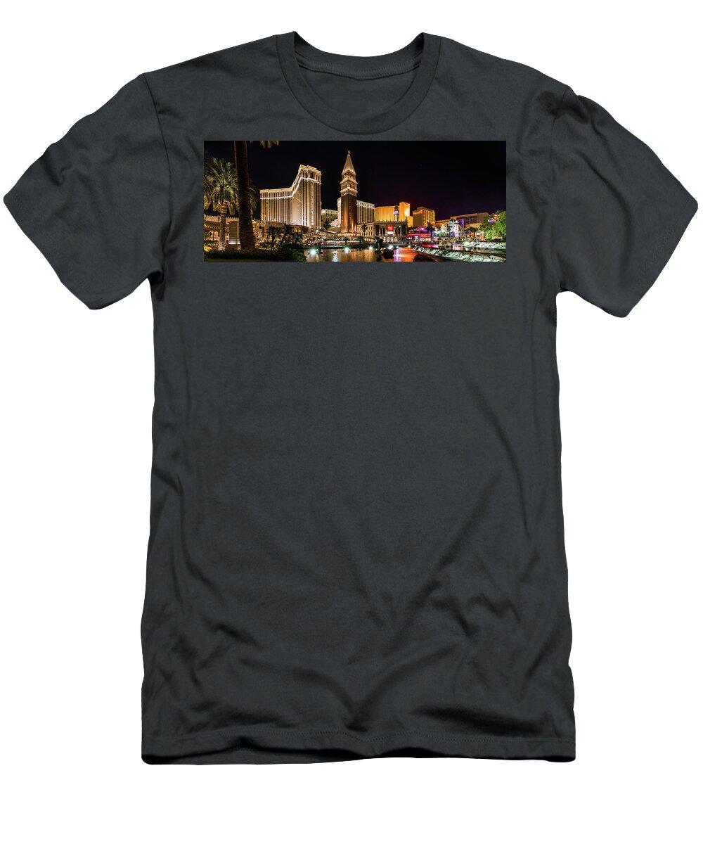 Venetian T-Shirt featuring the photograph The Venetian Casino in Front of the Mirage Lagoon at Night by Aloha Art
