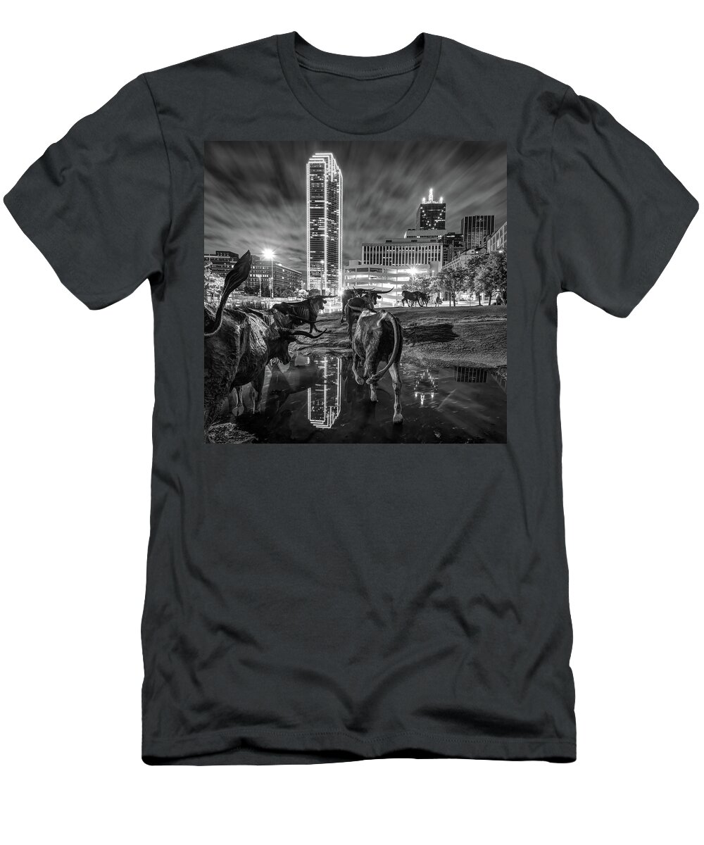America T-Shirt featuring the photograph Dallas Skyline and Texas Longhorn Cattle Drive Sculptures - Black and White by Gregory Ballos