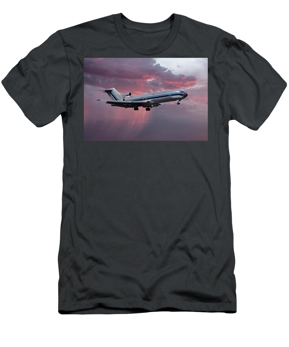 Eastern Airlines T-Shirt featuring the photograph Eastern Boeing 727-225 Landing in a Winter Storm Sunset by Erik Simonsen