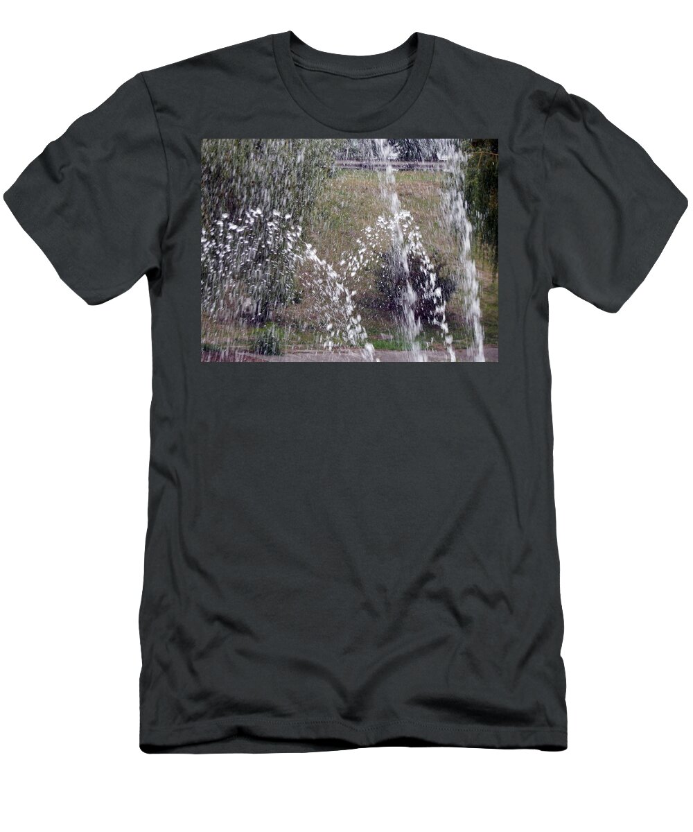Fountain T-Shirt featuring the photograph Fountains flow in the city on the river and in the park by Oleg Prokopenko