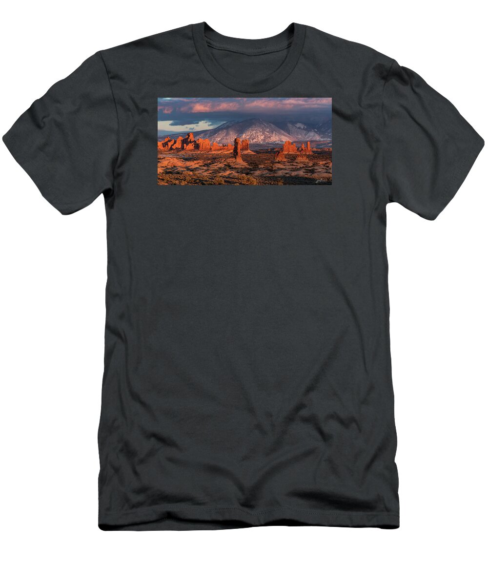 Arches National Park Moab Utah Sunset Red Rock Balanced Rock Hoodoos Towers T-Shirt featuring the photograph Arches Sunset Panorama #1 by Dan Norris