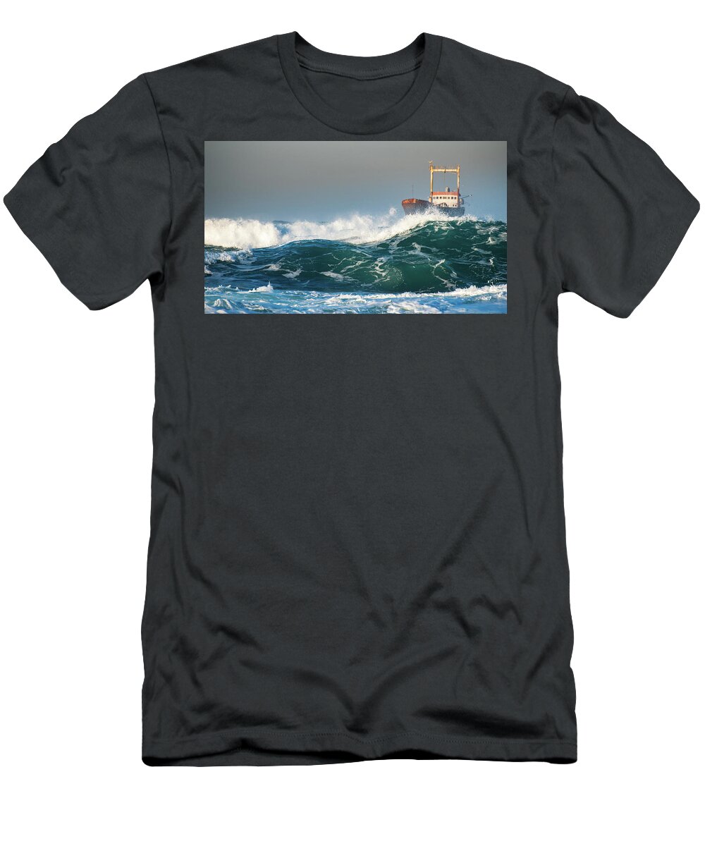 Shipwreck T-Shirt featuring the photograph Abandoned ship in the stormy ocean by Michalakis Ppalis