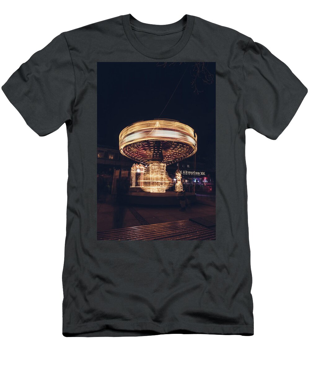 Illuminations T-Shirt featuring the photograph Christmas carousel on the streets of Warsaw. Fire Wheel by Vaclav Sonnek