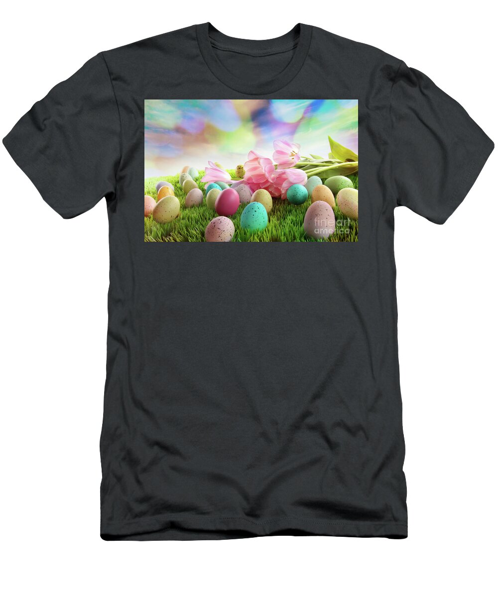 Blue T-Shirt featuring the photograph Easter eggs with tulips on grass with rainbow sky by Sandra Cunningham