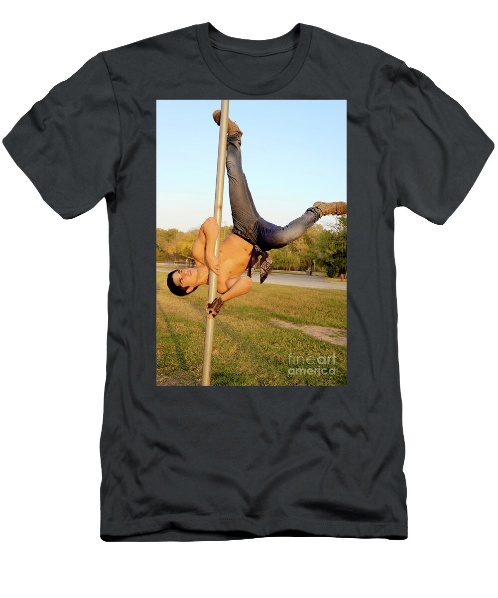 Handsome young hispanic man shows off some pole dance moves T-Shirt by  Gunther Allen - Pixels