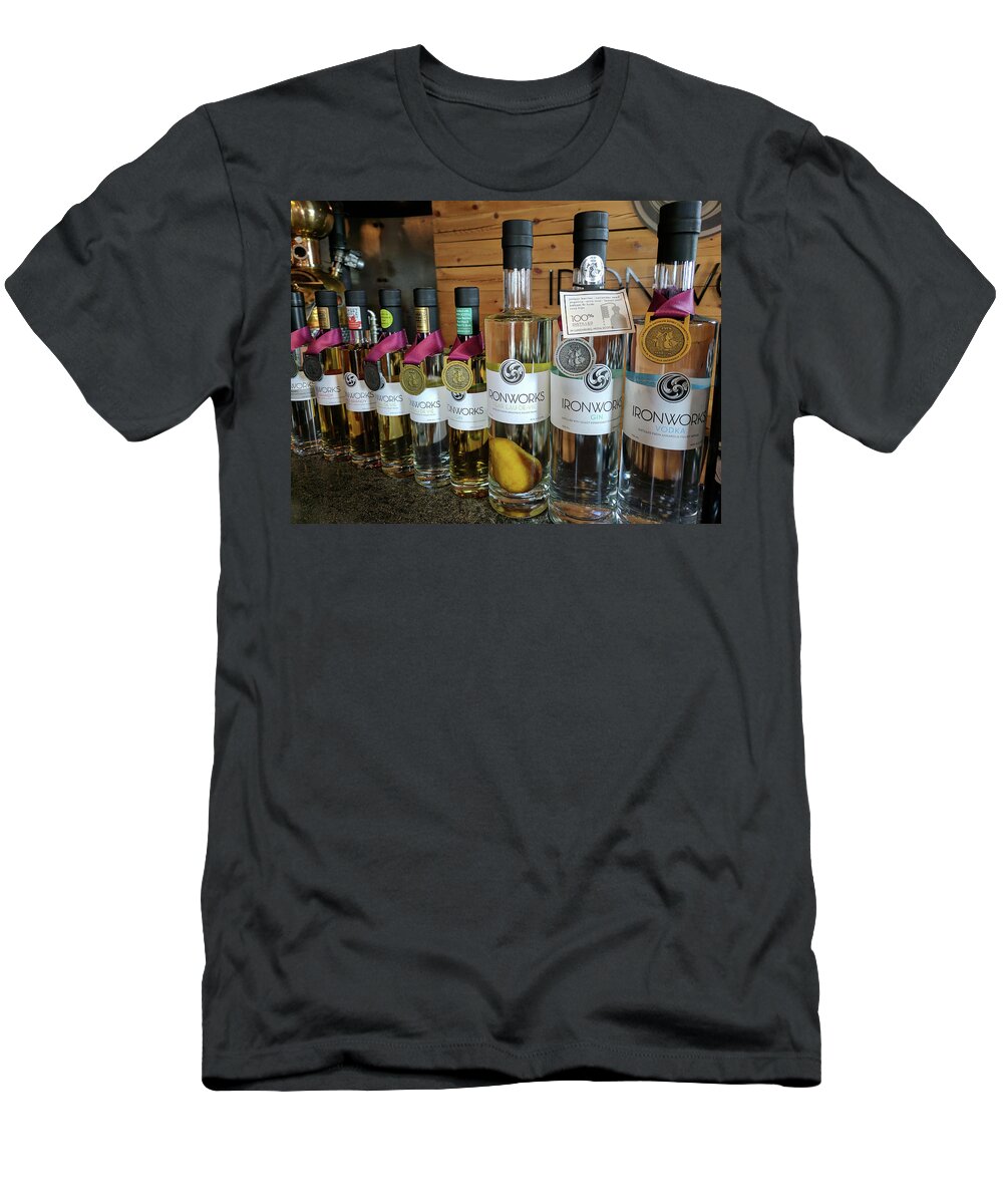Bottles T-Shirt featuring the photograph Ironwork Distillery Nova Scotia by Yvonne Jasinski