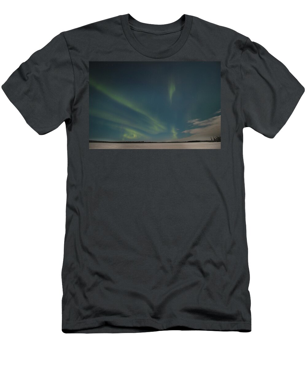 Aurora Borealis T-Shirt featuring the photograph Polar green lines on the dark sky. Northern lights by Vaclav Sonnek