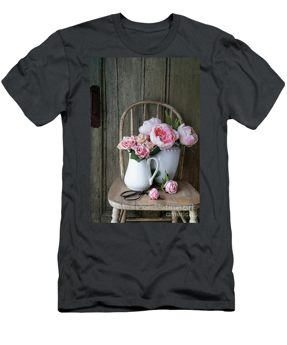 Background T-Shirt featuring the photograph Roses and peonies in white vases on rustic old chair by Sandra Cunningham
