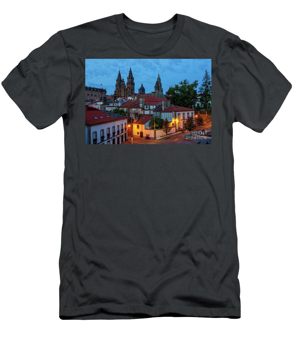 Way T-Shirt featuring the photograph Santiago de Compostela Cathedral Spectacular View by Night Dusk with Street Lights and Tiled Roofs La Corua Galicia by Pablo Avanzini