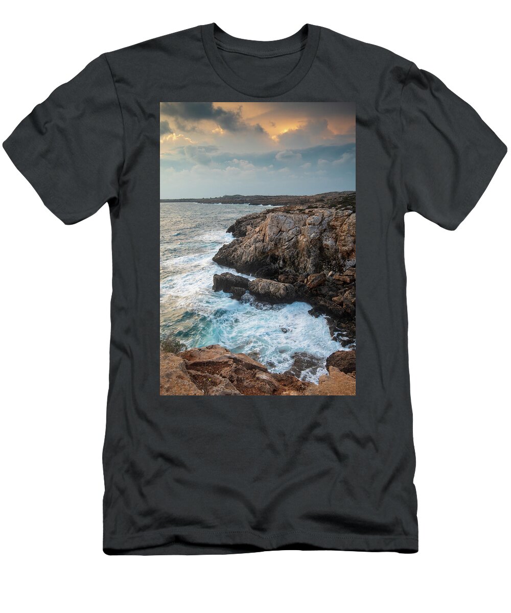 Stormy Sea T-Shirt featuring the photograph Seascape with windy waves during stormy weather at sunset. by Michalakis Ppalis