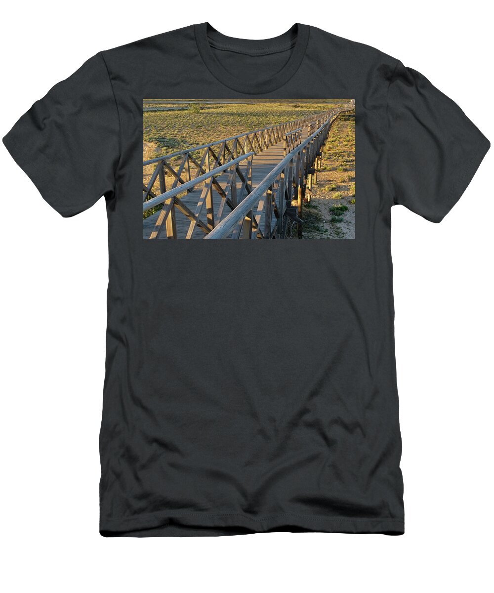 Quinta Do Lago T-Shirt featuring the photograph View of the wooden bridge in Quinta do Lago by Angelo DeVal