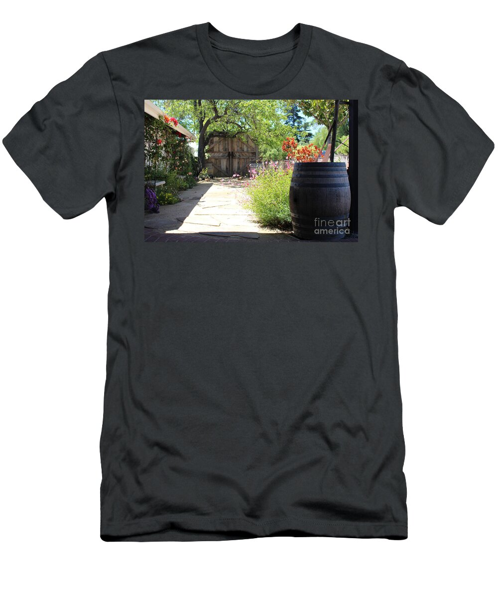 Wooden Barrel T-Shirt featuring the photograph Wooden Barrel In Garden Solvang CA by Colleen Cornelius