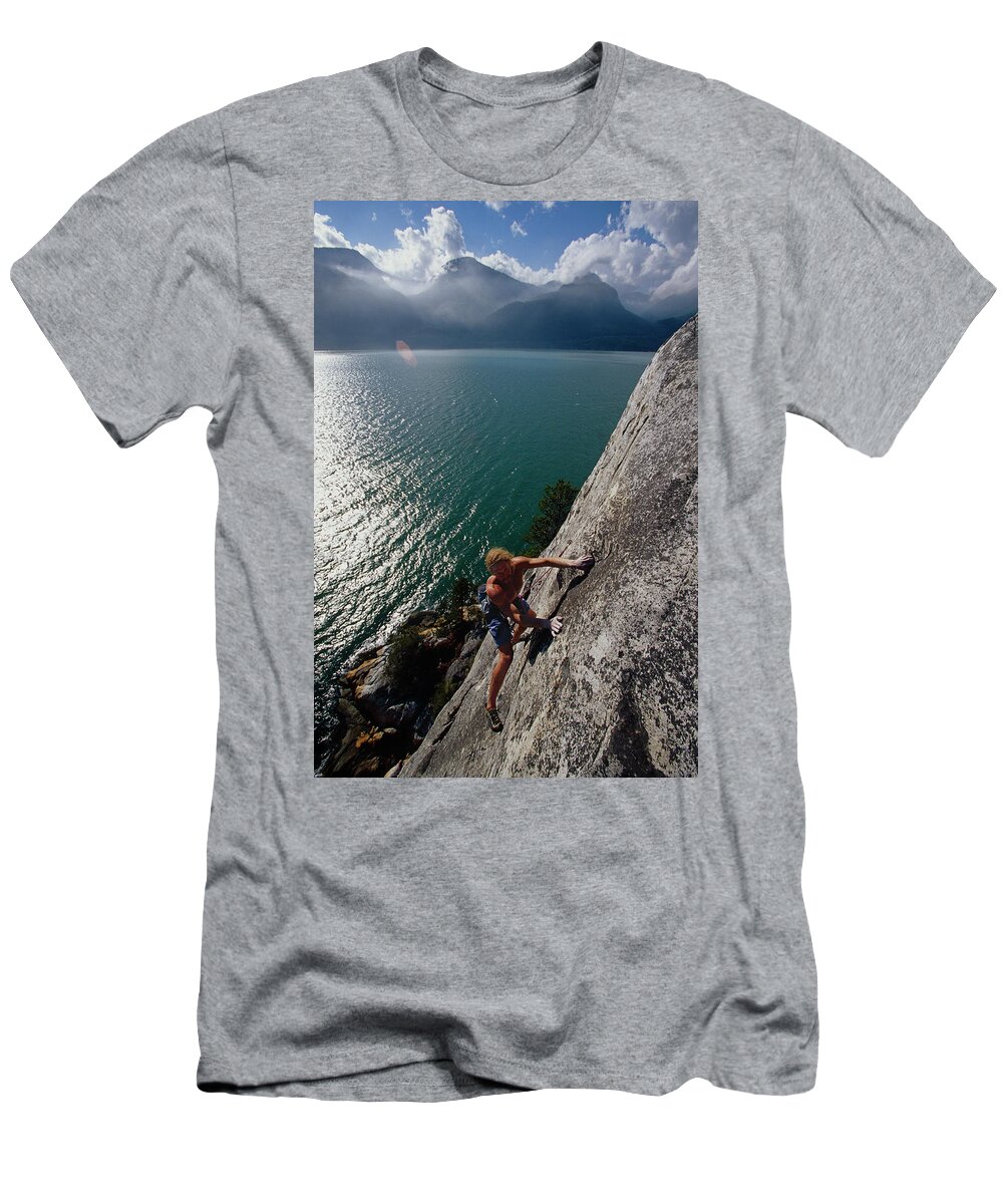 hverdagskost hydrogen toilet Man Rock Climbing Above Water, Canada T-Shirt by Whit Richardson - Fine Art  America