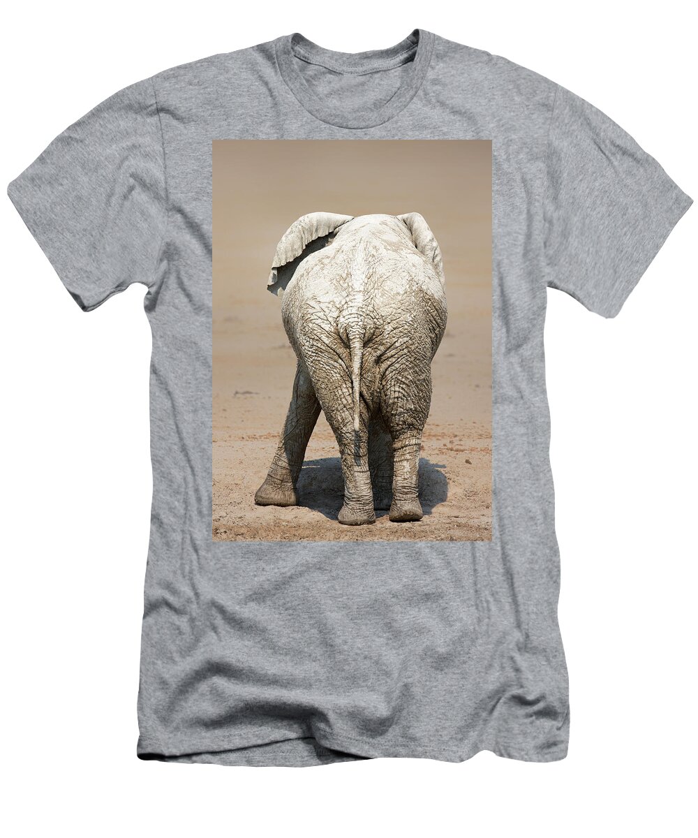 Elephant T-Shirt featuring the photograph Muddy elephant with funny stance by Johan Swanepoel