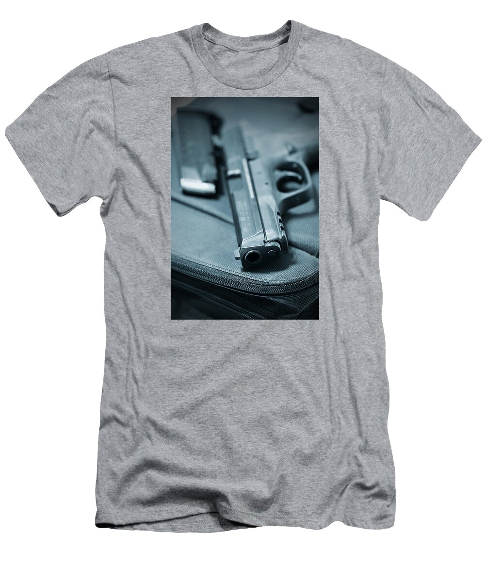 Armed T-Shirt featuring the photograph On the Lam by Trish Mistric