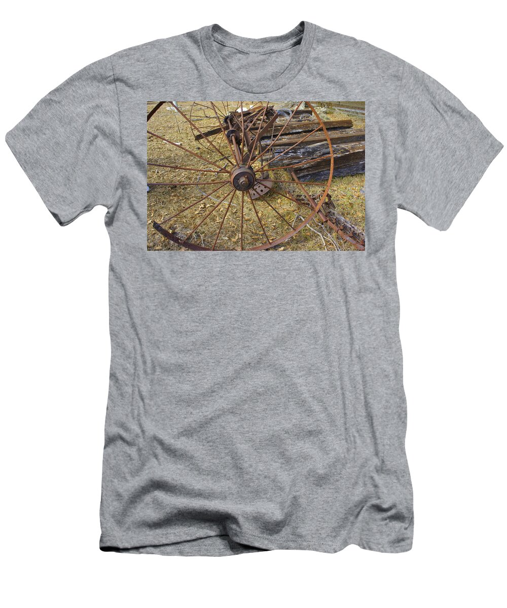 Field T-Shirt featuring the photograph Rusty Wheel by Laurie Perry