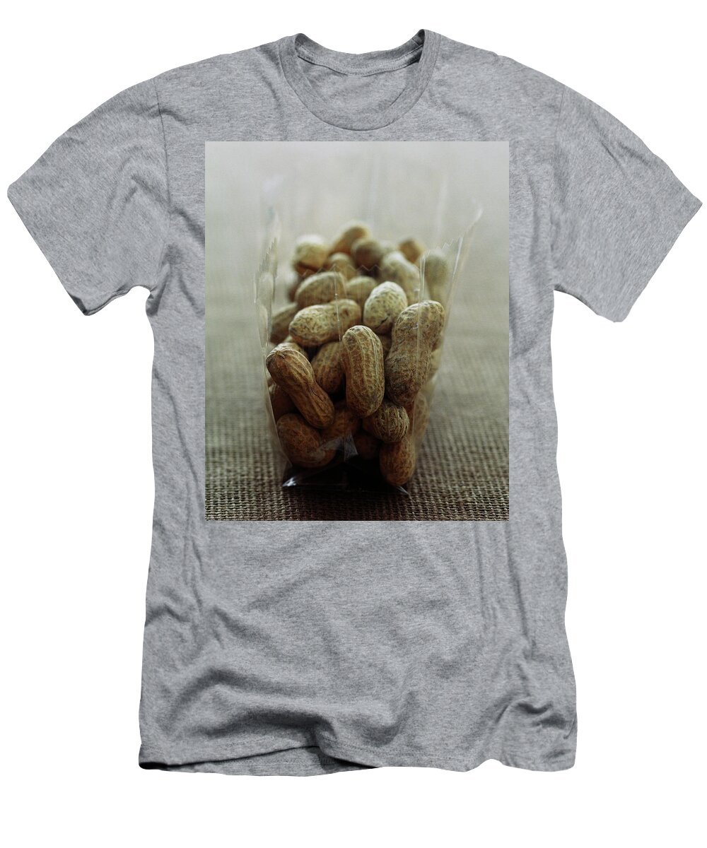 Cooking T-Shirt featuring the photograph Unshelled Peanuts by Romulo Yanes