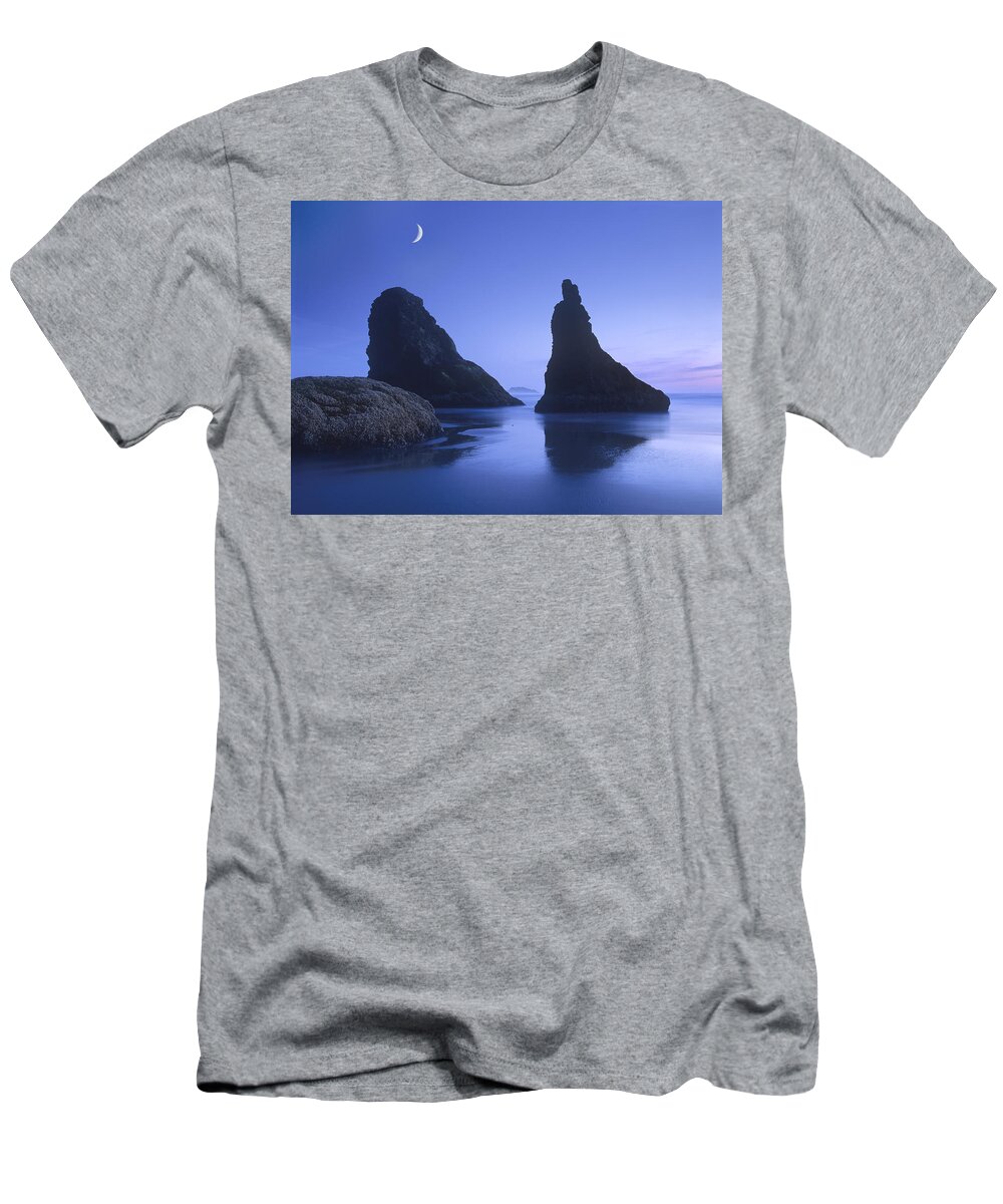 00175681 T-Shirt featuring the photograph Sea Stacks At Dusk Along Bandon Beach by Tim Fitzharris
