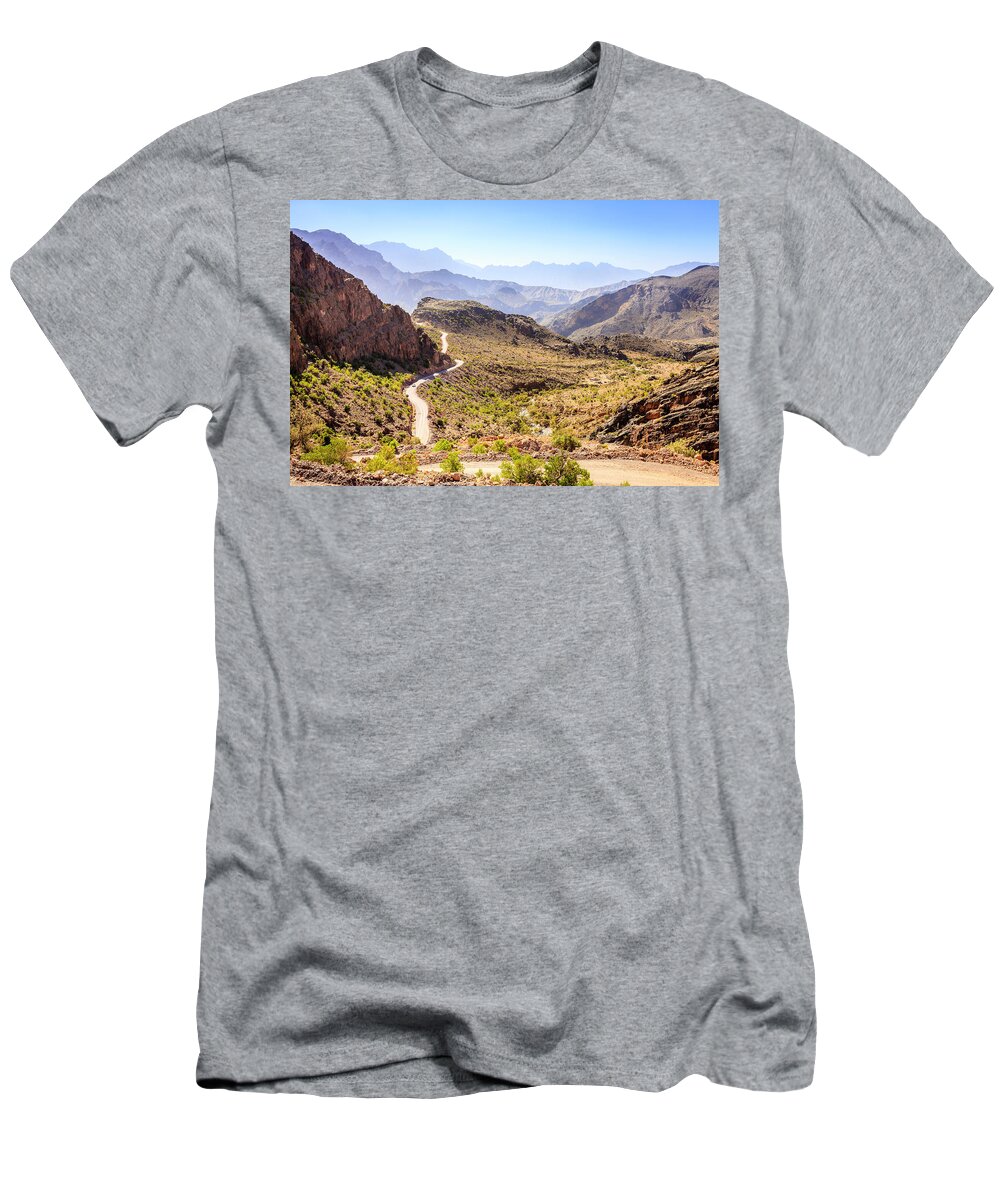 Al Hajar T-Shirt featuring the photograph Mountain road in Oman #1 by Alexey Stiop
