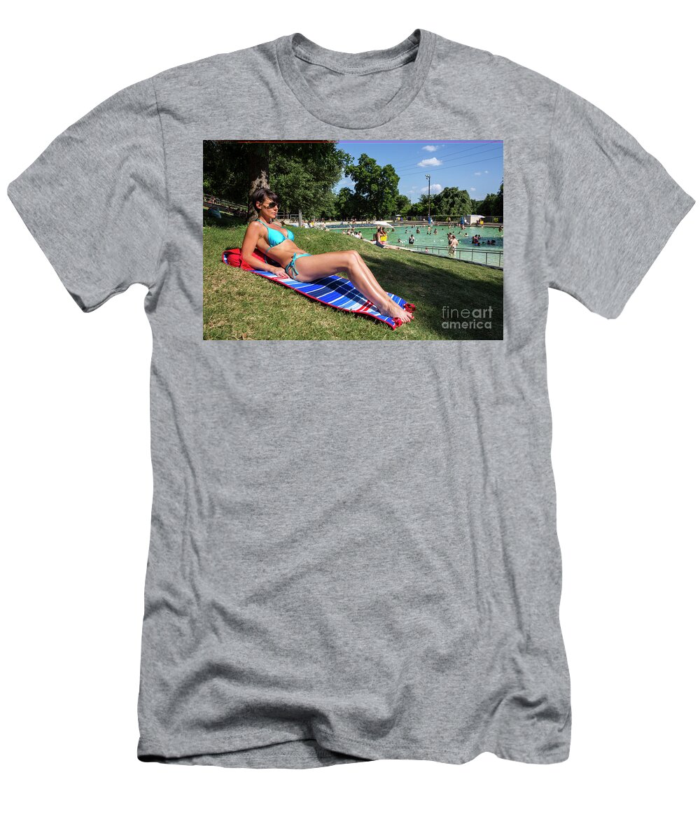 Deep Eddy Pool T-Shirt featuring the photograph Attractive model in bikini at Deep Eddy Pool, sunbathing on sunny day in Austin, Texas by Dan Herron