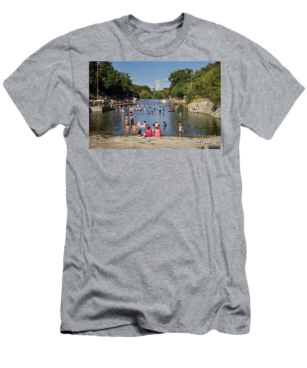 Barton Springs Pool T-Shirt featuring the photograph Austinites love to lounge in the refreshing waters of Barton Spr by Dan Herron