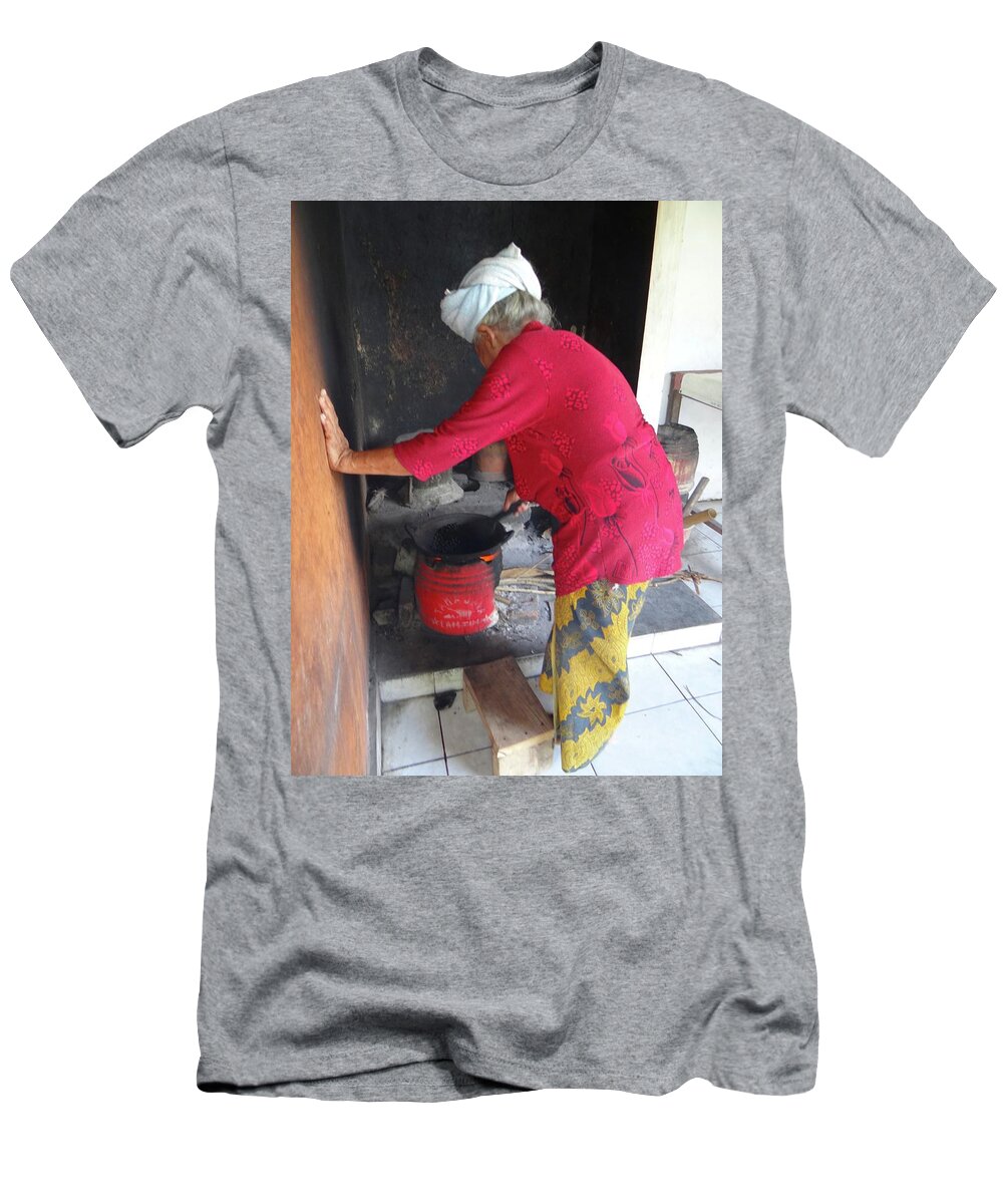 Exploramum T-Shirt featuring the photograph Balinese lady roasting coffee leans again wall by Exploramum Exploramum