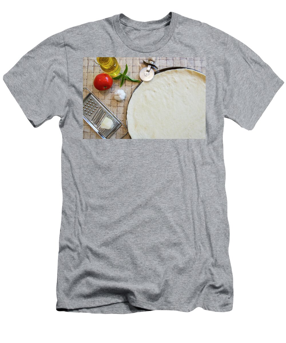 Basil T-Shirt featuring the photograph Cheese margarita pizza ingredients and raw crust with cutter by Karen Foley