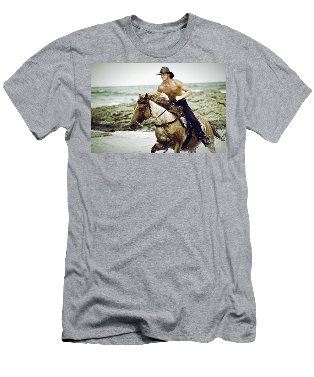 Horse T-Shirt featuring the photograph Cowboy riding horse on the beach by Dimitar Hristov