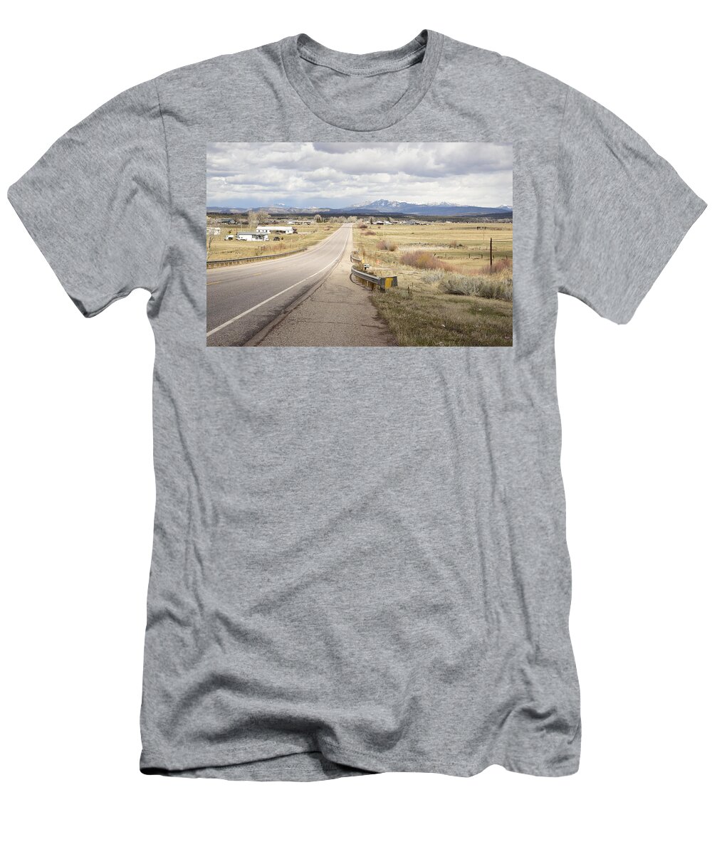 Highway; Distance; Horizon; Future; Village; Lonesome; Far Mountains; Perspective; Vista; Range; Scope; New Mexico T-Shirt featuring the photograph Far Horizon by Tom Cochran