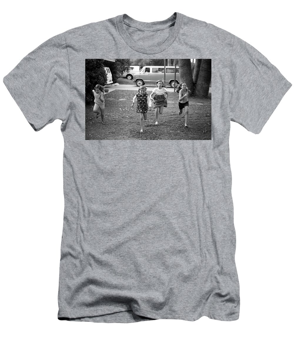 Racing T-Shirt featuring the photograph Four Girls Racing, 1972 by Jeremy Butler
