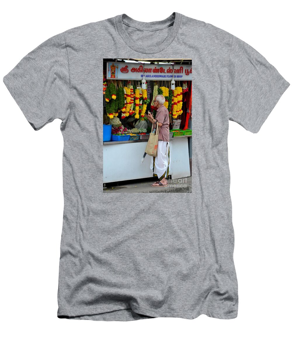 Singapore T-Shirt featuring the photograph Indian man stands at Little India flower garland shop Singapore by Imran Ahmed