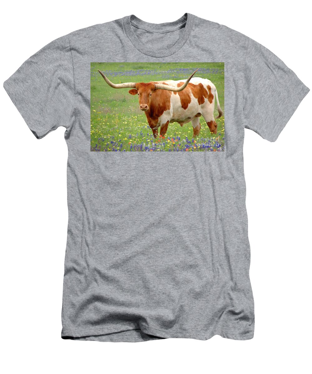 Texas Longhorn In Bluebonnets T-Shirt featuring the photograph Texas Longhorn Standing in Bluebonnets by Jon Holiday