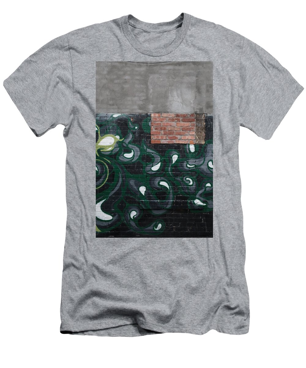 Urban T-Shirt featuring the photograph Fertilizing The Belligerent by Kreddible Trout