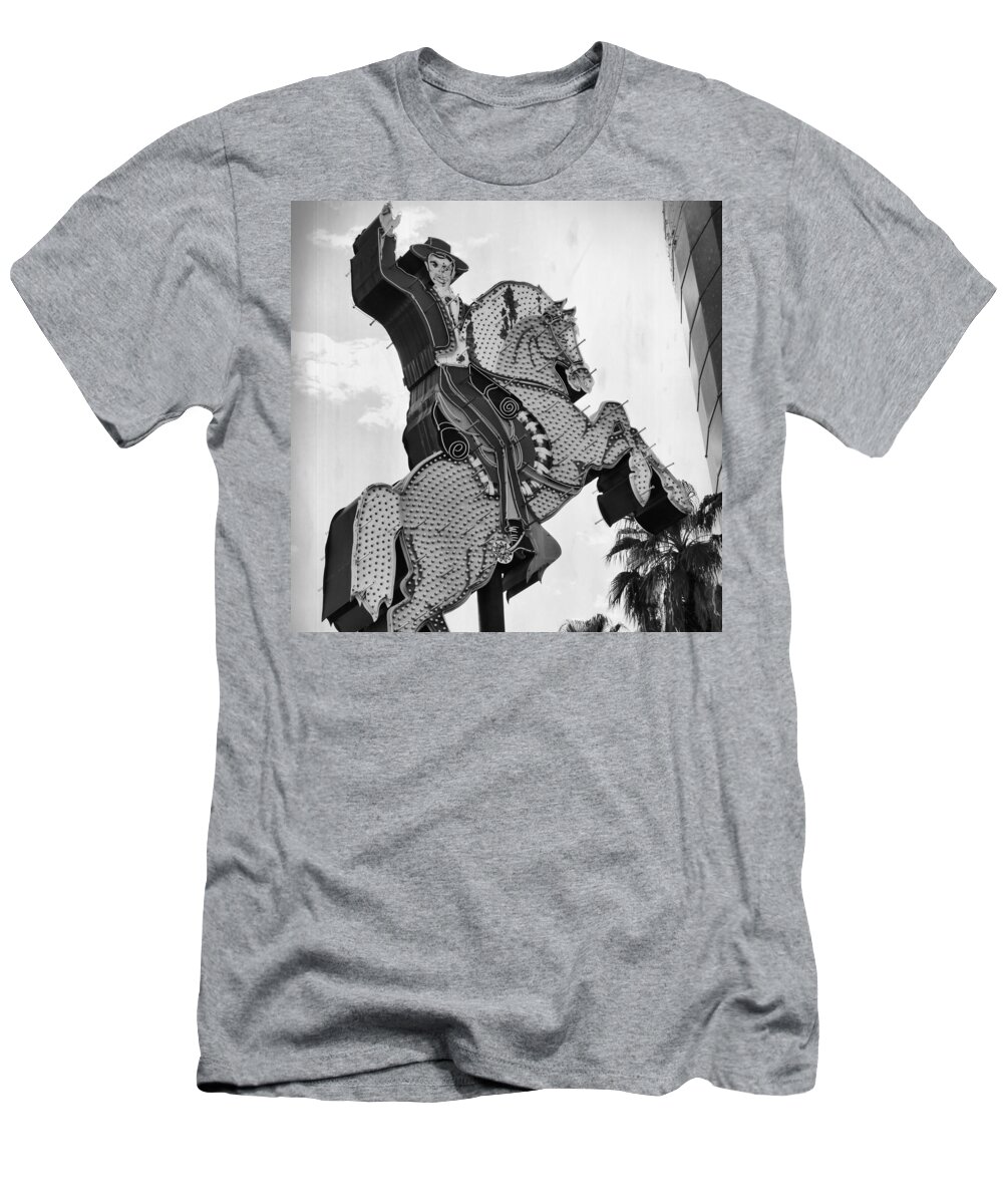 Cowboy T-Shirt featuring the photograph The Hacienda Horse And Rider Neon Sign BW by Mary Pille