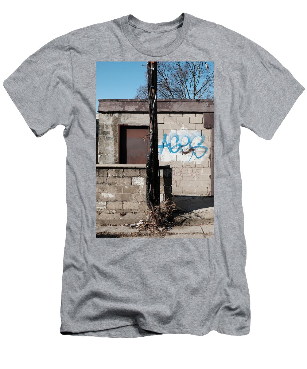 Urban T-Shirt featuring the photograph Small Shack, Short Wall And A Pole by Kreddible Trout