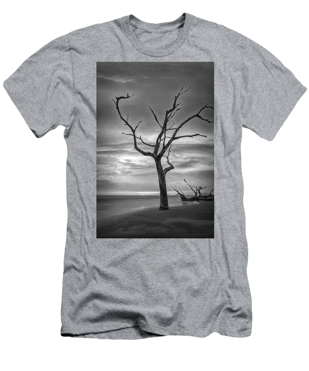 Clouds T-Shirt featuring the photograph Standing Alone on Jekyll Island Driftwood Beach Black and White by Debra and Dave Vanderlaan