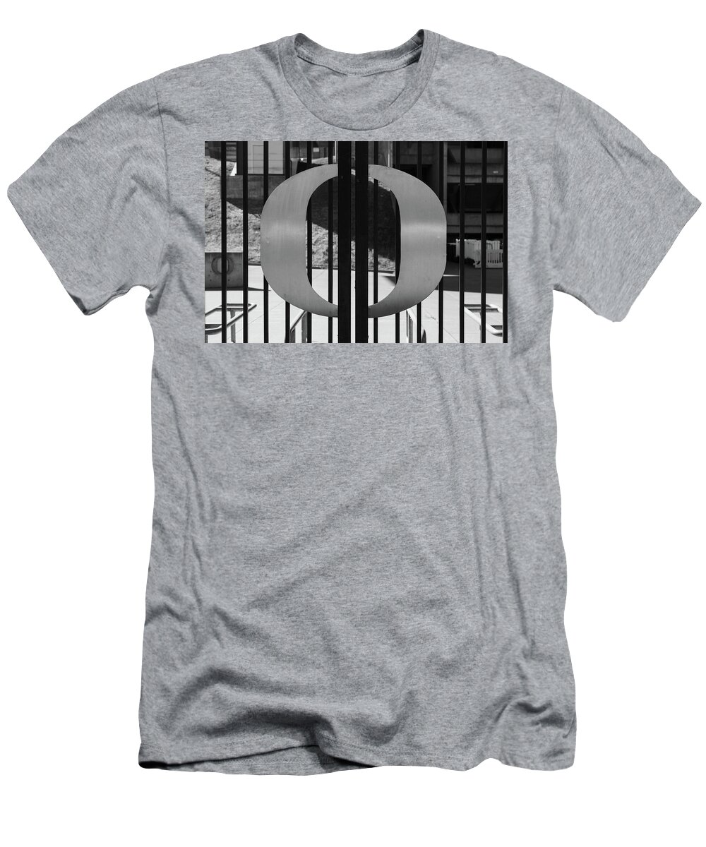 Pac 10 T-Shirt featuring the photograph University of Oregon logo on gate in black and white by Eldon McGraw