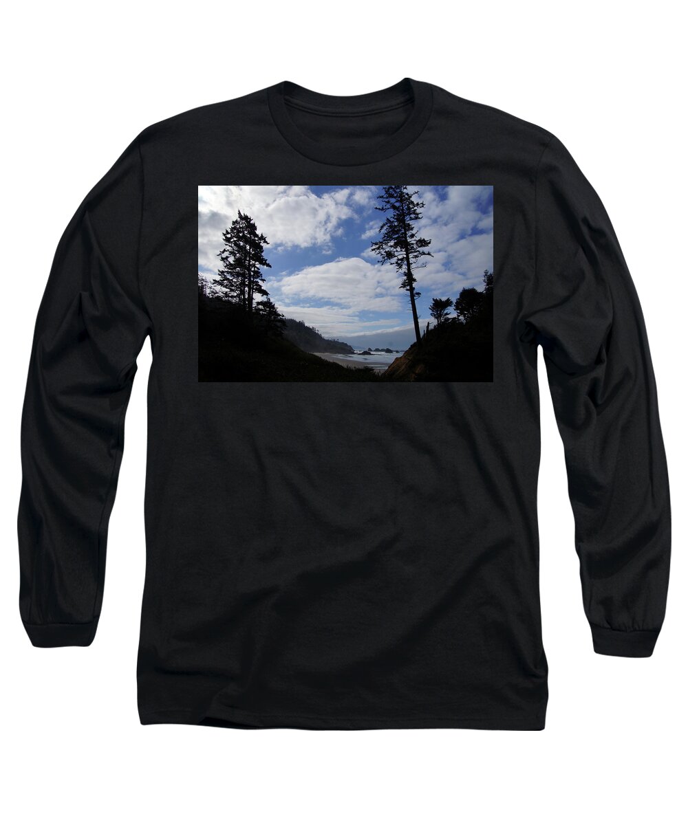 Beach Long Sleeve T-Shirt featuring the photograph Silhouette of large conifers on coastal headland #4 by Steve Estvanik