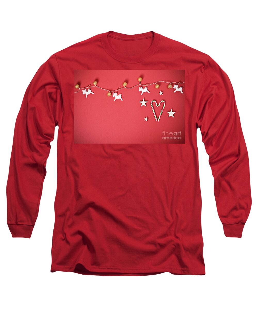 Seasonal Long Sleeve T-Shirt featuring the photograph Seasonal greeting card concept with Christmas lights and candy cane heart by Mendelex Photography