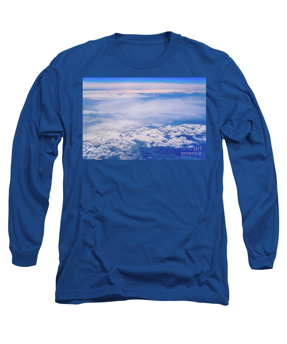 Across Long Sleeve T-Shirt featuring the photograph Intense blue sky with white clouds and plane crossing it, seen from above in another plane. by Joaquin Corbalan