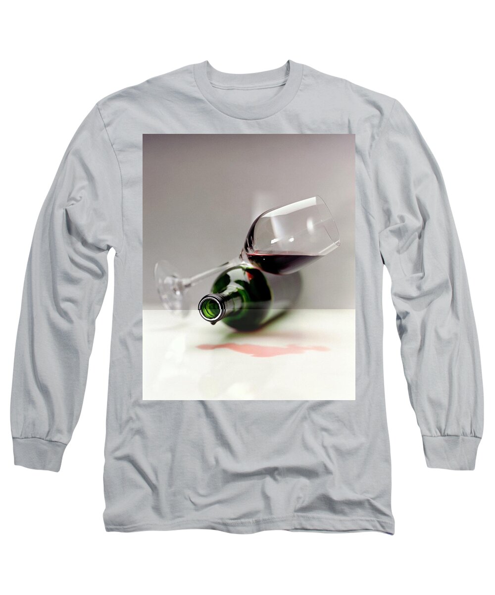 Beverage Long Sleeve T-Shirt featuring the photograph A Wine Bottle And A Glass Of Wine by Romulo Yanes