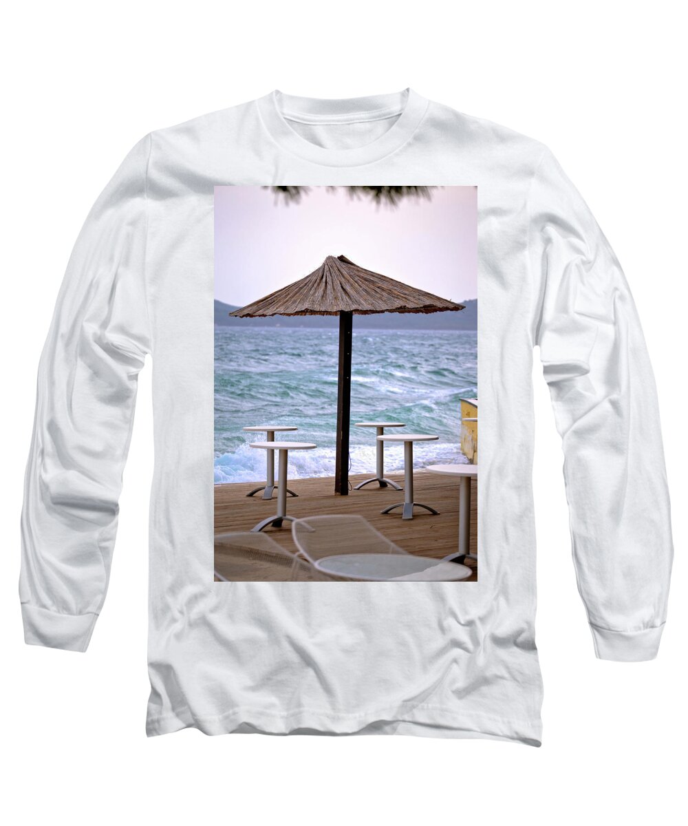 Beach Long Sleeve T-Shirt featuring the photograph Beach bar parasol by rough sea by Brch Photography