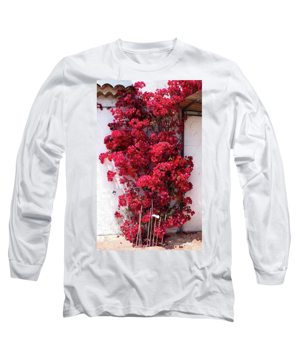 Background Long Sleeve T-Shirt featuring the photograph Glowing red bougainvillea in front of a white wall by Jean-Luc Farges