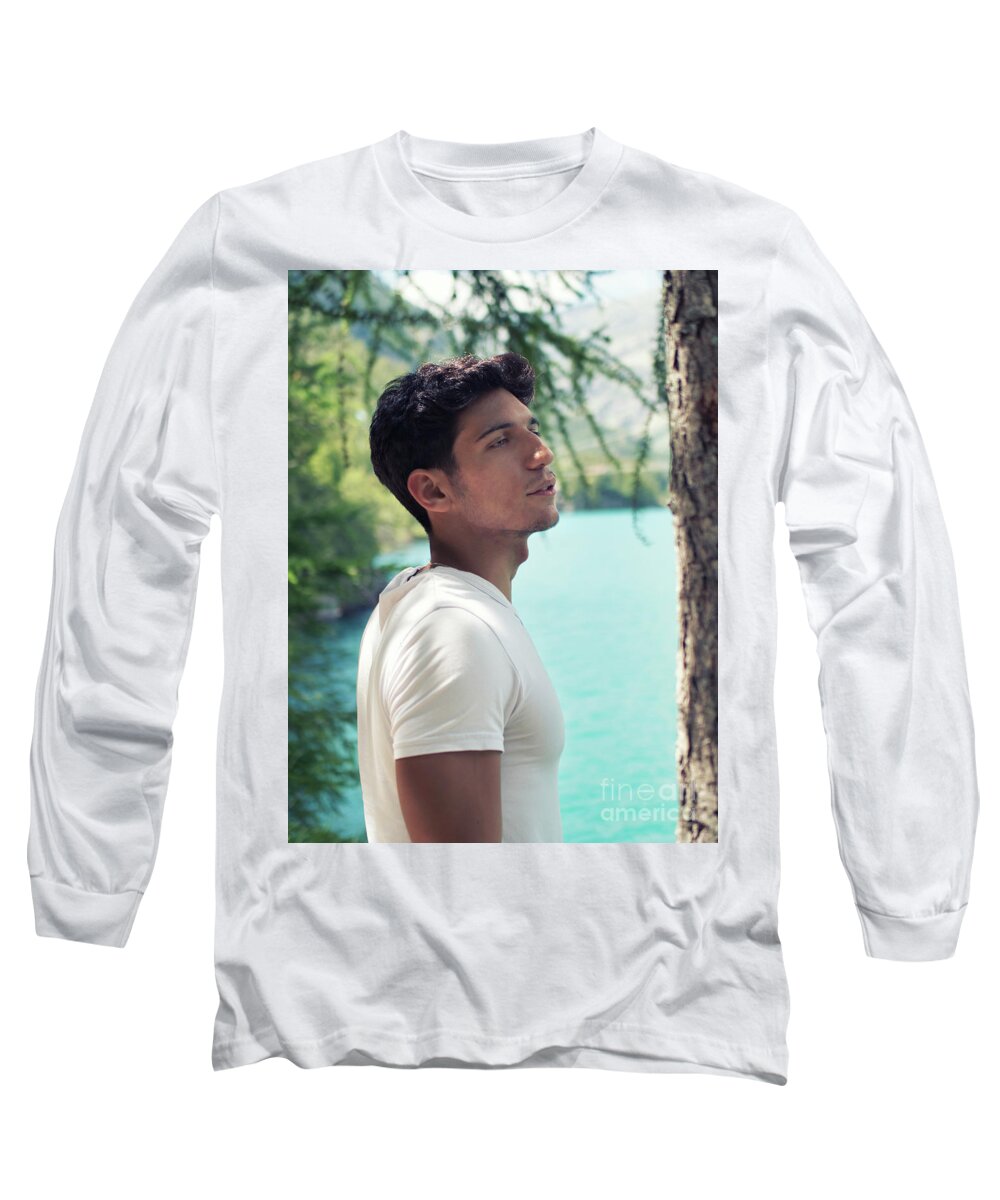 Handsome young man hiking in lush green mountain scenery Long Sleeve T-Shirt  by Stefano C - Pixels