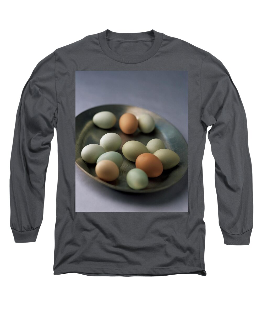 Cookingeggsstill Lifenobodyegganimalsbowlselective Focusrawfood #condenastgourmetphotograph April 1st 2001 Long Sleeve T-Shirt featuring the photograph A Bowl Of Eggs by Romulo Yanes