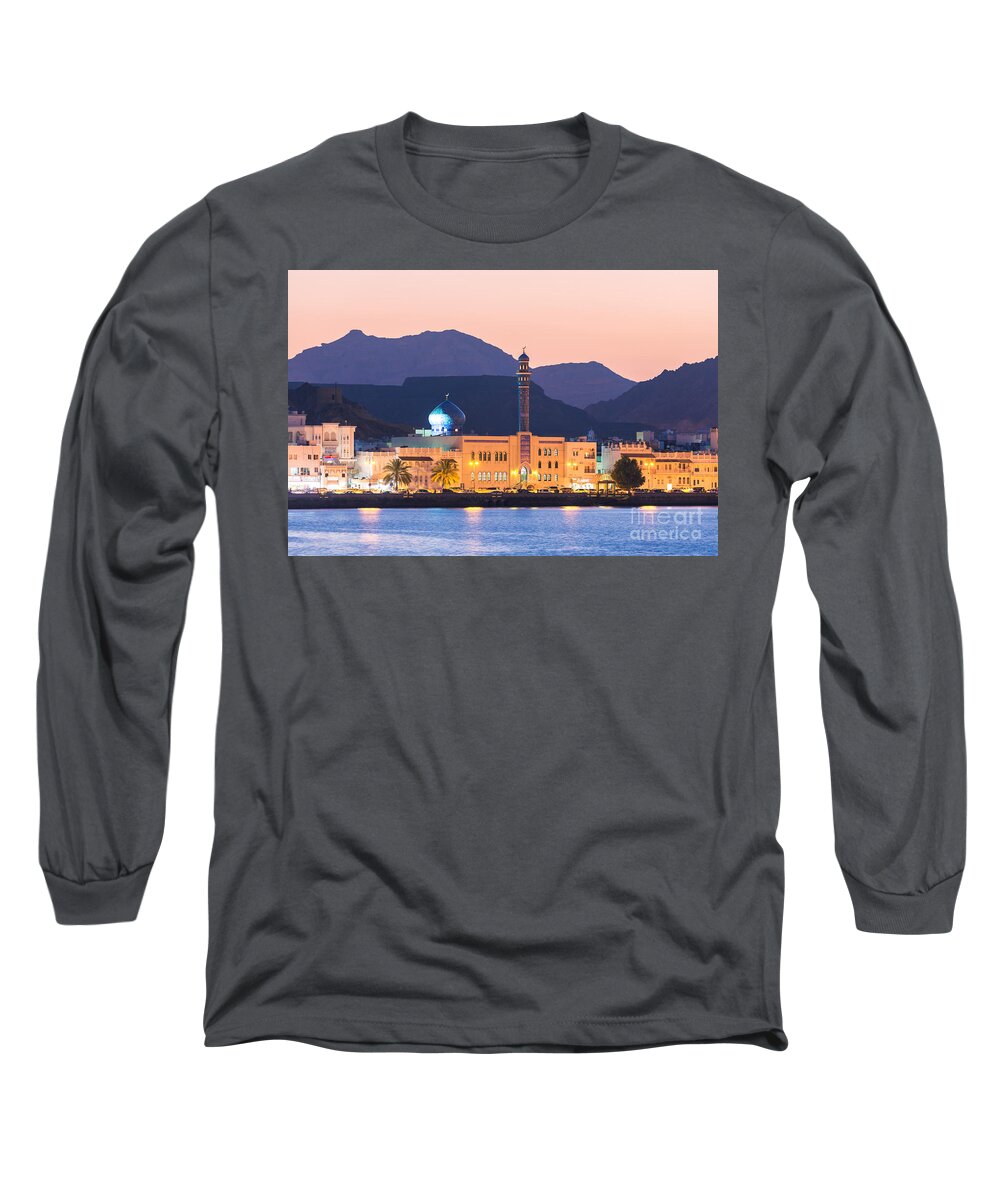 Oman Long Sleeve T-Shirt featuring the photograph Oman - Muscat - Mutrah harbour and old town at dusk by Matteo Colombo