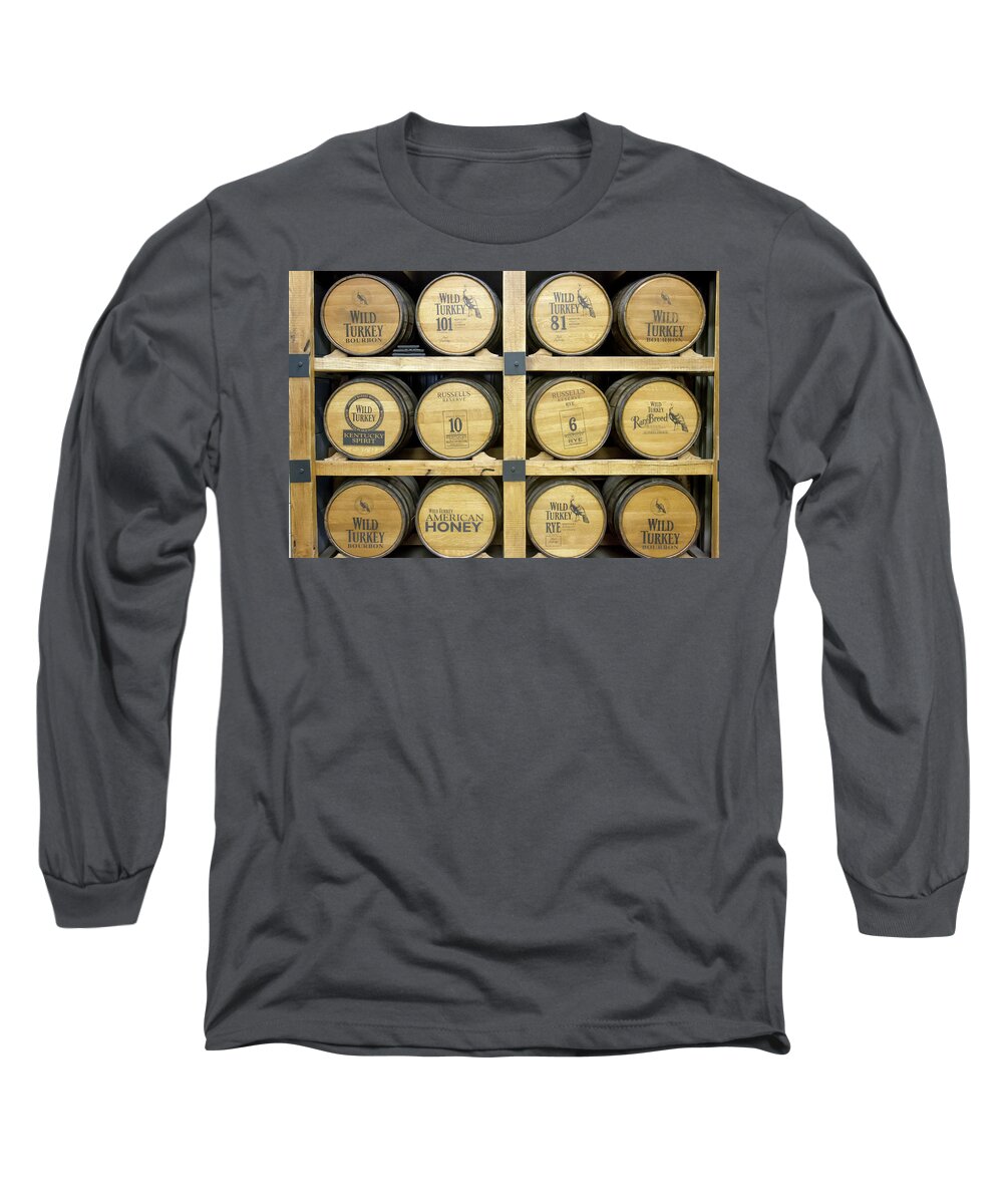 American Long Sleeve T-Shirt featuring the photograph Barrels of Wild Turkey Bourbon in distillery by Karen Foley