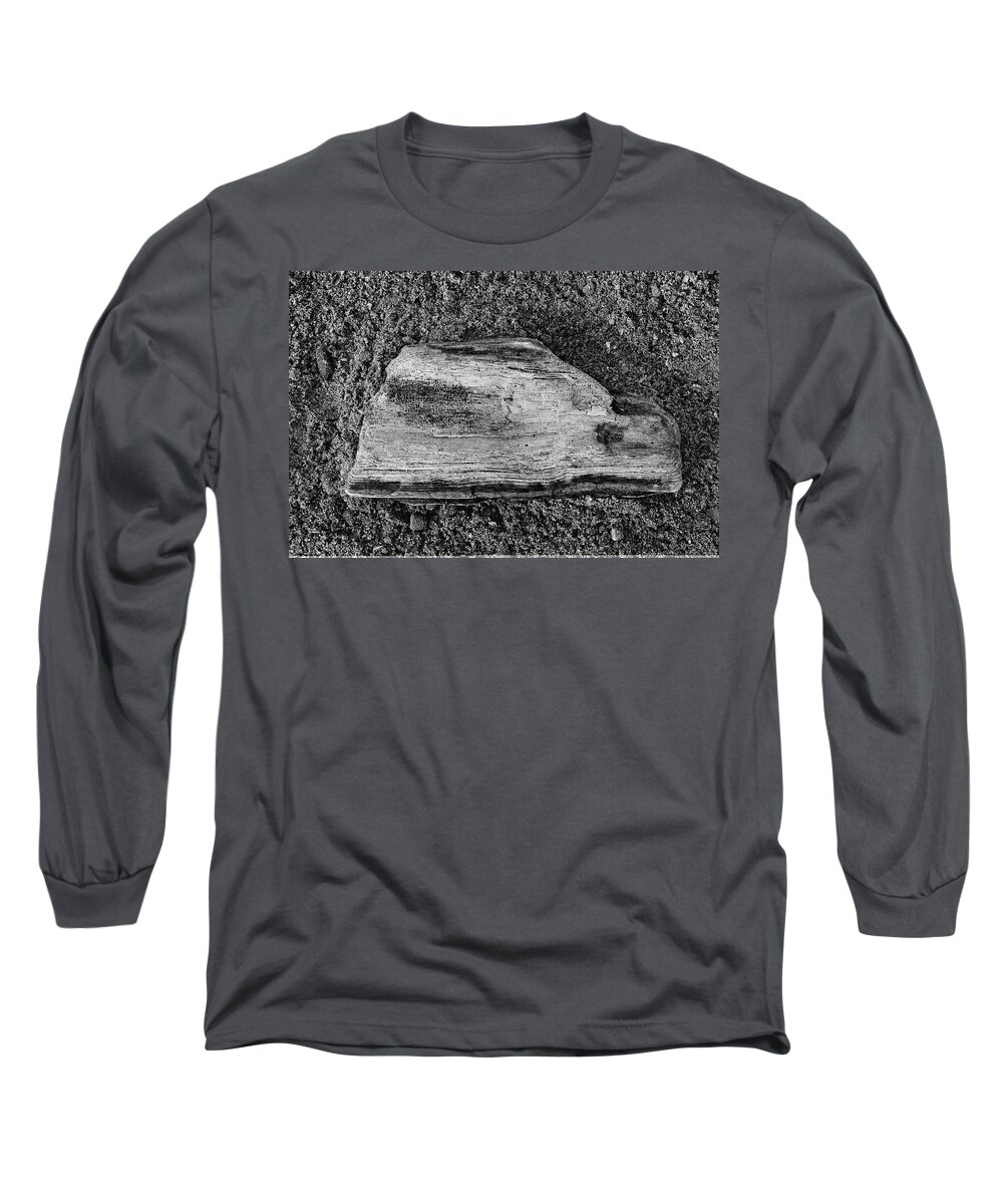 Driftwood Long Sleeve T-Shirt featuring the photograph Driftwood on Sand Monochrome by Jeff Townsend